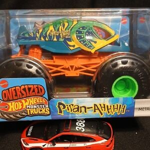 Piran-Ahhh.  Oversized Monster Truck - Green and Yellow With Orange Frame